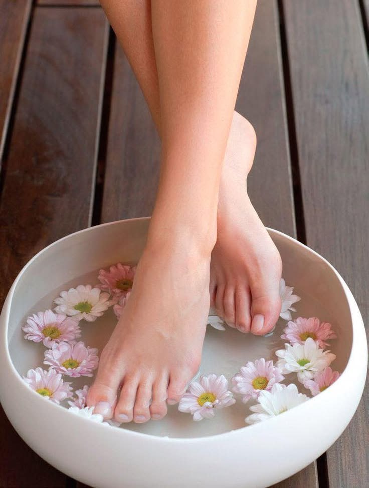 Relaxing pedicure soak with fresh flowers