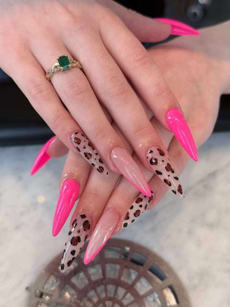 Pink stiletto nails with leopard print accents